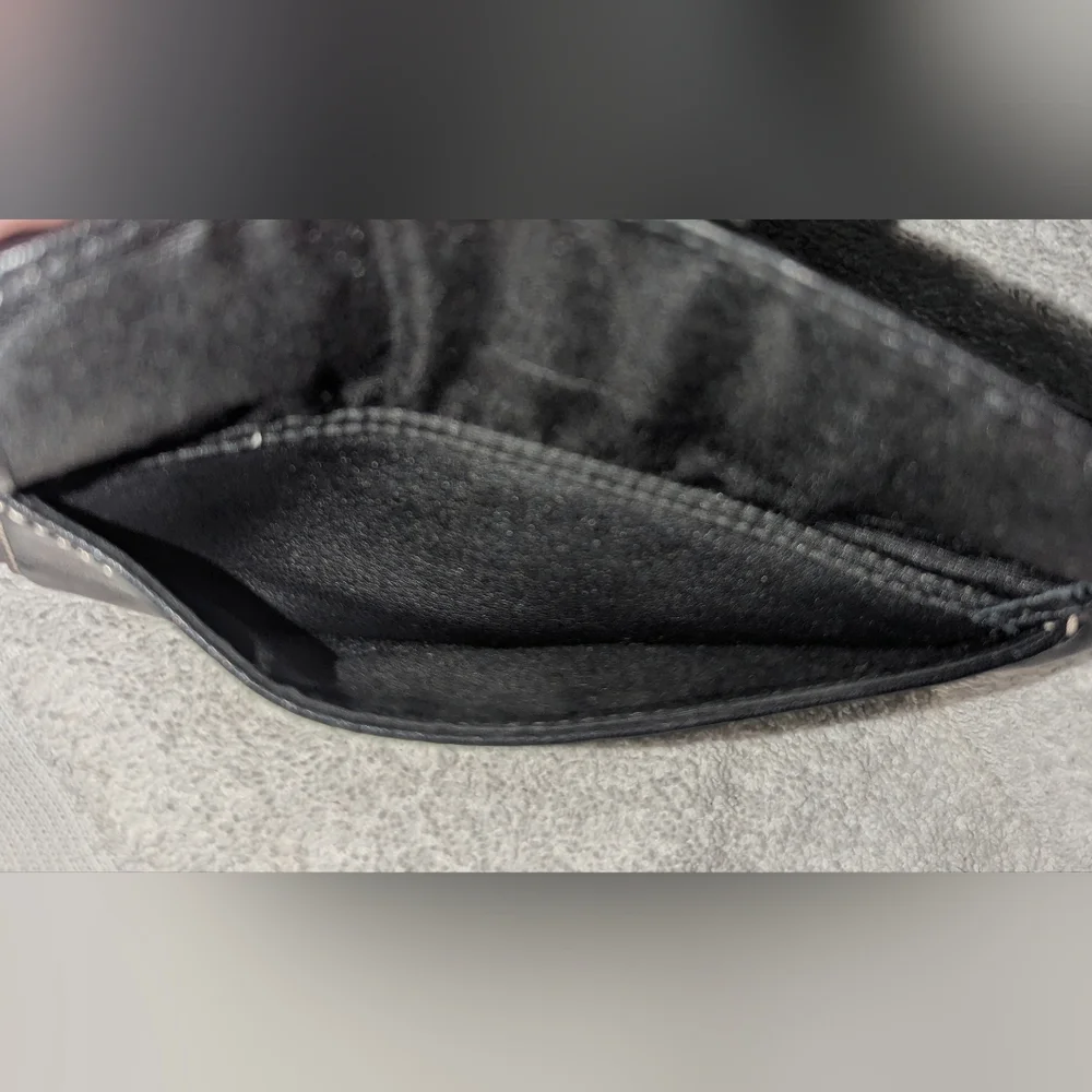 Coach Black and Silver Leather Wristlet Clutch